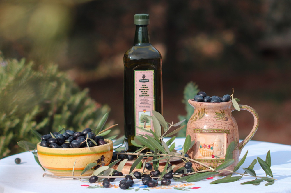 Olive oil.  Olive oil is a good choice for the paleo diet.